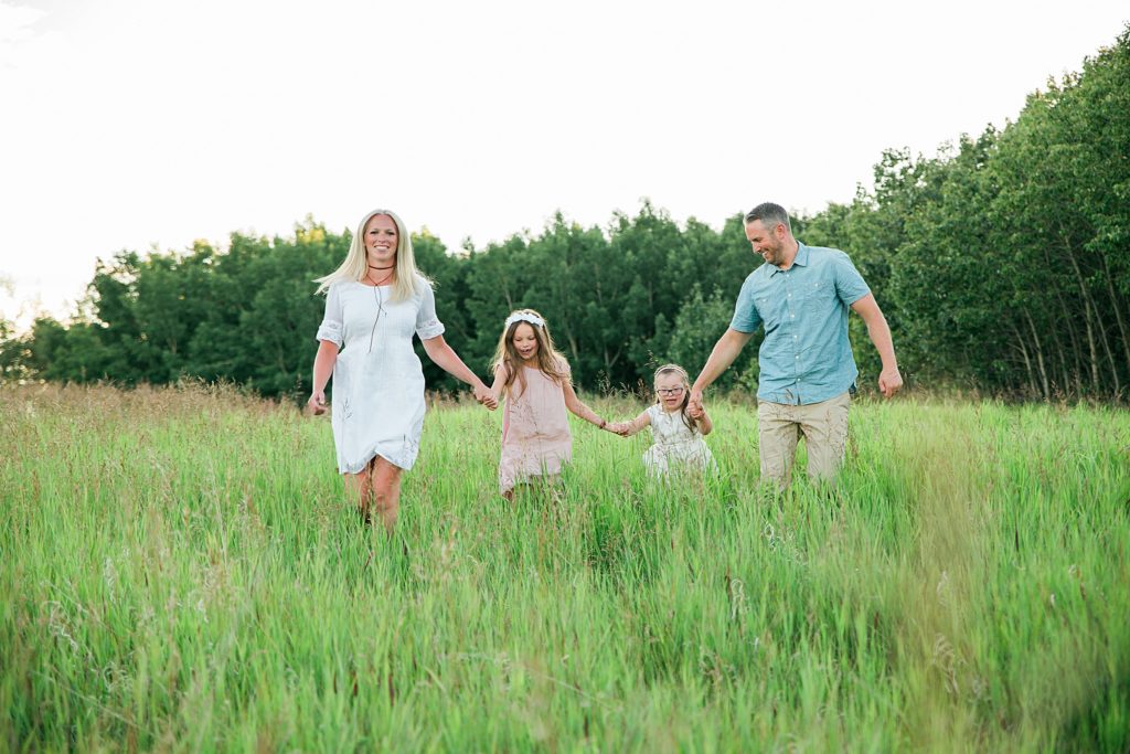 family running through field, family photos