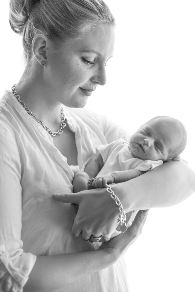 black and white,lifestyle newborn photos, mom and newborn girl
