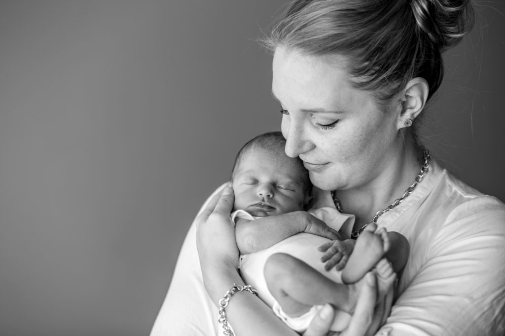 black and white, lifestyle newborn photos, mom and newborn girl, at home newborn session