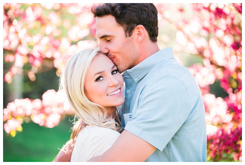engagement photos in the blossoms at Edworthy Park