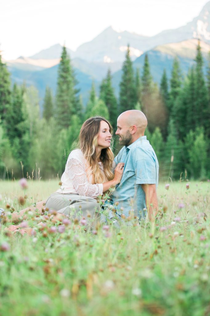 couple in field, mountains,